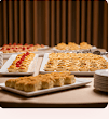 Assorted baked goods arranged for an event order